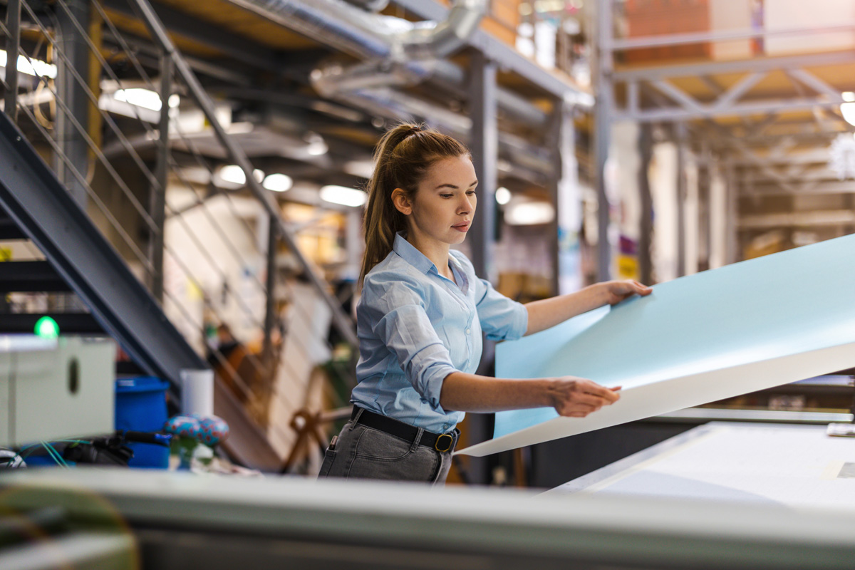 Woman working in printing factory